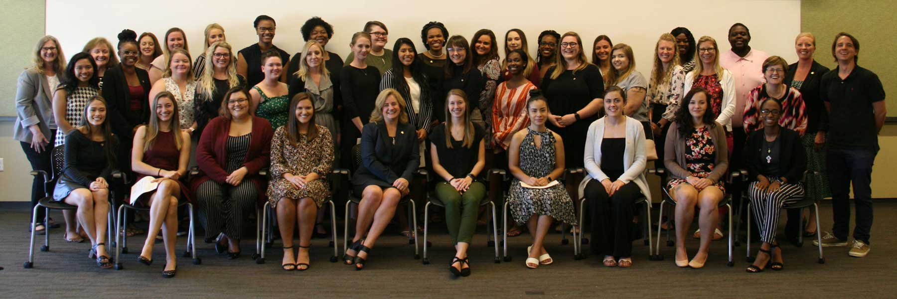 group photo of eta sigma gamma members