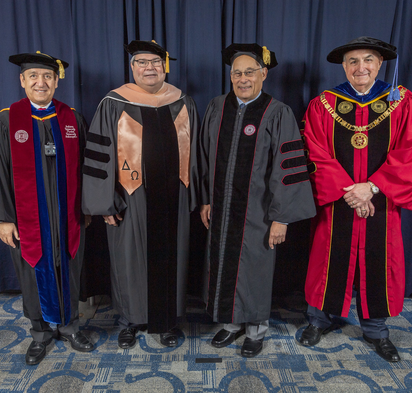Donald M. Berwick poses with IU Indianapolis personnel