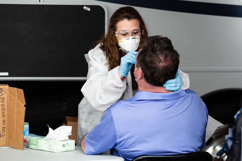 patient receiving covid test