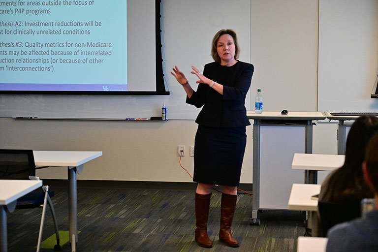 instructor speaks in classroom