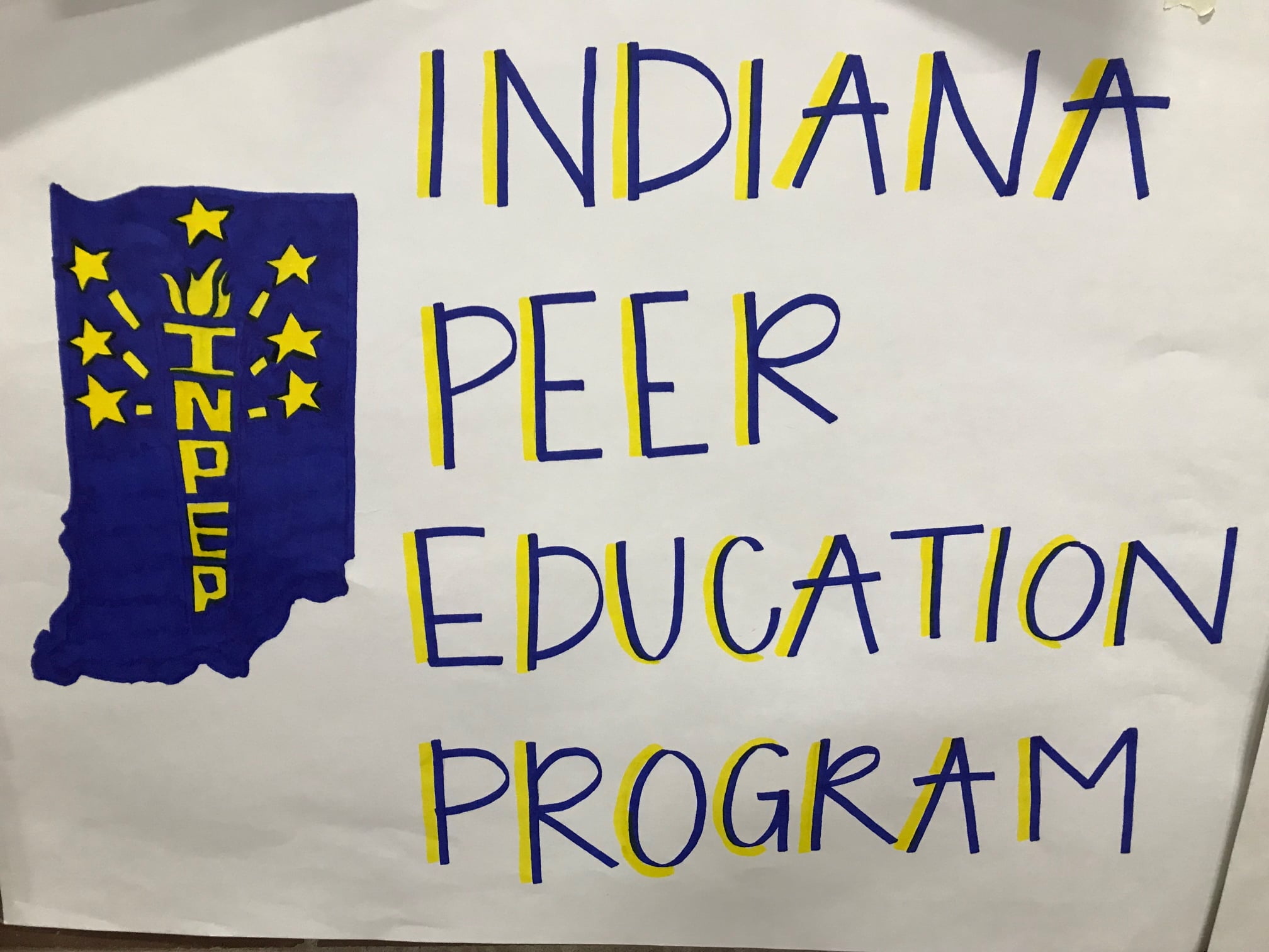 inpep logo drawing on a banner