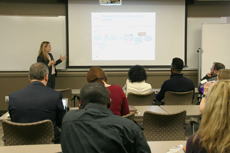 instructor speaks in classroom